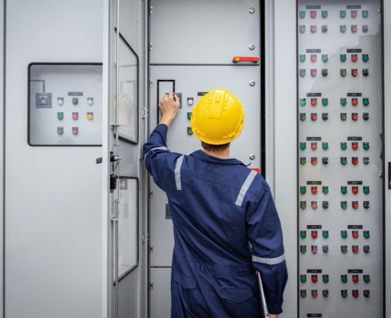 Commercial electrician at work